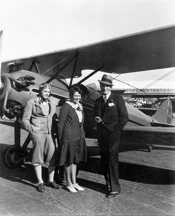 Waco INF NC625Y, Date & Location Unknown, with (L-R) Les Bowman, Martie Bowman & C.C. Ludlow (Source: Heins)